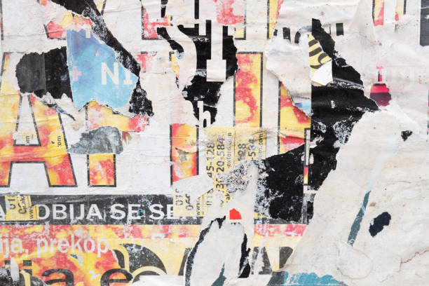 istock Old street poster background. Torn and ripped abstract paper texture 1391011644