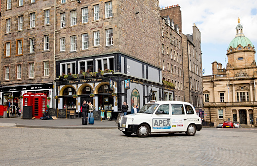 A taxi on the Royal Mile in Edinburgh, Scotland