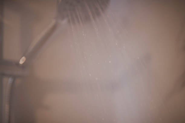 istock woman taking hot shower 1391012008