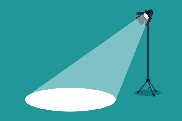 Silhouette of light lamp projector on a tripod with scattered rays. Projecting a beam of spotlight is glowing on down. Cinema background. Template for festive banner, flyer, poster with place for text Silhouette of light lamp projector on tripod with scattered rays. Projecting a beam of spotlight is glowing on down. Cinema background. Template for festive banner, flyer, poster with place for text tripod vector stock illustrations