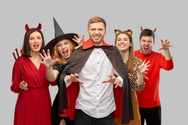 istock friends in halloween costumes scaring 1391013630