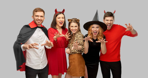istock friends in halloween costumes scaring 1391014979