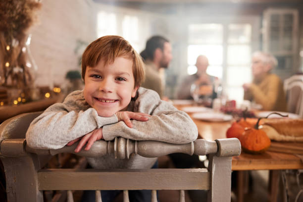 istock Happy little boy in dining room. 1391017936