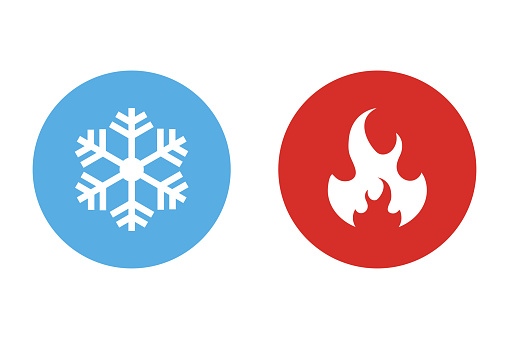 Hot and Cold Vector Icon. Fire and Ice sign. Snowflake and Burning Flame isolated on white