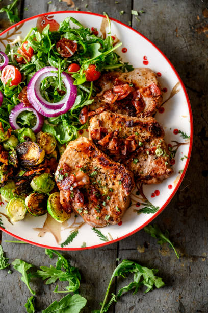 istock Pork chops with brussel sprouts salad 1391022007