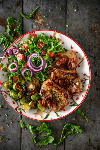 istock Pork chops with brussel sprouts salad 1391022246