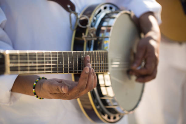 istock A musician playing guitar during a wedding ceremony on the island. 1391025317