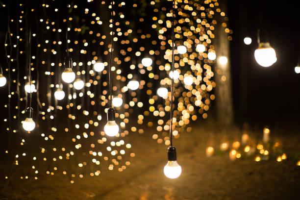 istock Wedding ceremony evening with candles and lamps in the coniferous pine forest. 1391025866