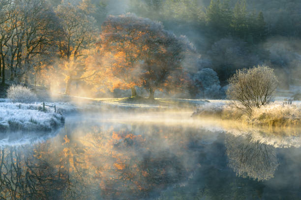 istock Misty Autumn Reflections In The Lake District, UK. 1391026707