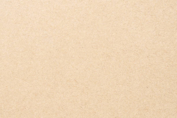 istock Natural pale brown paper texture pad abstract background 1391027120