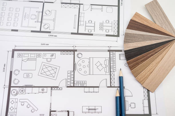 istock wooden vinyl samples with drawing instruments onn house plan blueprint 1391027999