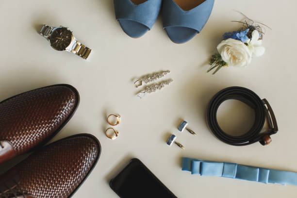 istock Men's and women's wedding accessories on the table 1391032184
