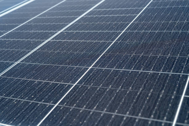 istock new solar panels are standing on the ground covered with grass 1391032719