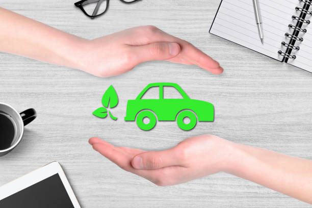 istock Electric car and insurance protection concept 1391035794