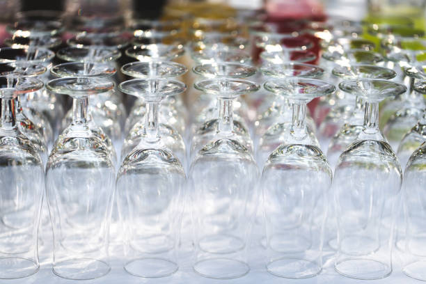 istock Set of blank empty wine glasses displayed in rows. Preparation for the holiday. 1391047721