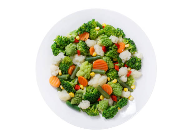 istock plate of steamed vegetables isolated on a white background 1391050152