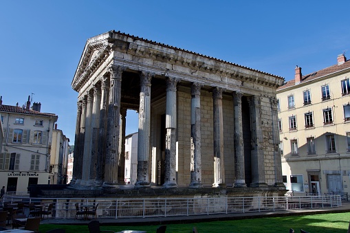 Temple of Augustus and Livia in the morning sun. This  is a Roman temple built at the beginning of the 1st century in Vienne, France