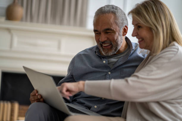 istock Senior Couple Searching the Internet Together 1391051207