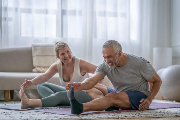 istock Senior Couple Working Out at Home 1391051252