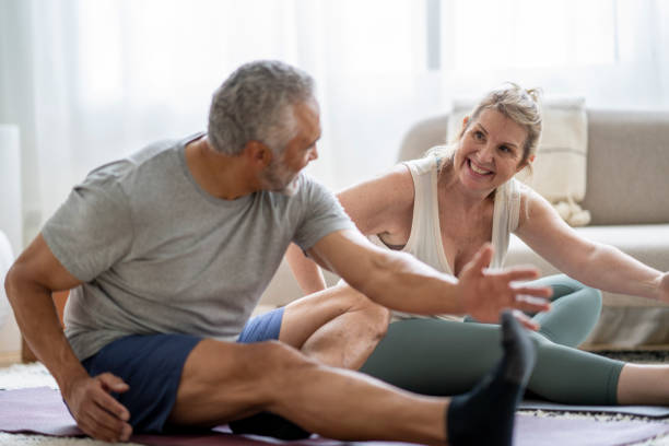 istock Senior Couple Working Out at Home 1391051258