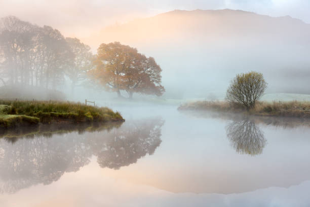 istock Majestic Sunrise On Misty River, Lake District, UK. 1391051555