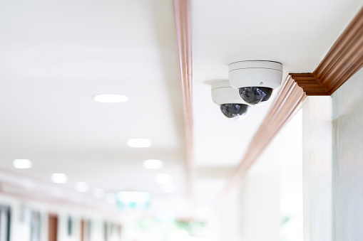CCTV camera is installed inside the hospital building on the ceiling and wall for monitoring and running safety system control in that area.