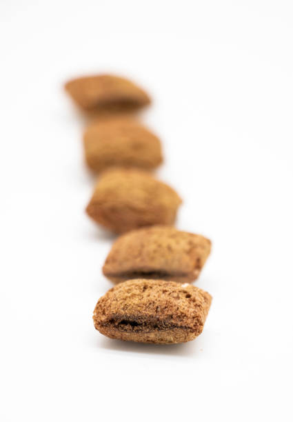 istock close-up chocolate chips isolated on white background 1391054281