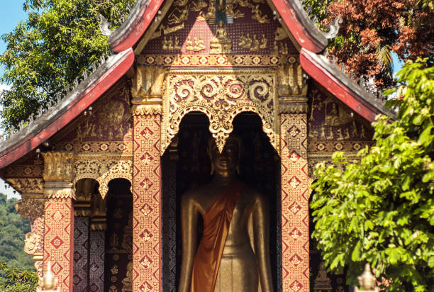Wat Sop Sickharam Temple in Luang Prabang, Laos, is the use of Khmer-style balustrades to decorate the open windows The gable ends are richly ornamented with foliate designs