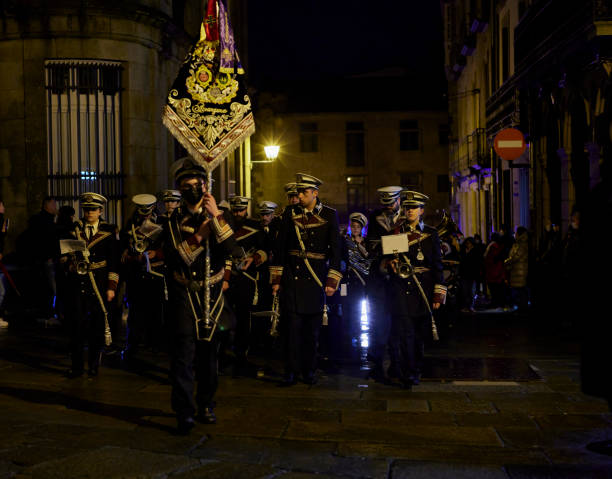 Holy week Santiago de Compostela, Spain (April 11, 2022).  Is one of the most solemn celebrations in Spain. The Nazarenes or brotherhoods walk the streets hooded with hoods carrying religious images snake hood stock pictures, royalty-free photos & images