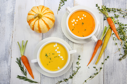 White table, carrot, pumpkin, bisque, bowl, thyme, gourmet, cream