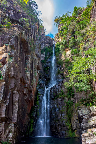 istock Stunning waterfall called Veu da Noiva between moss covered rocks and the vegetation 1391059156