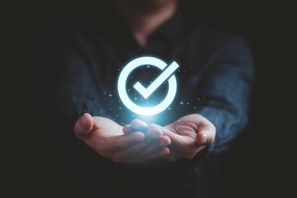 istock Businessman have giving  with tick correct mark to approve document and project concept. 1391059505
