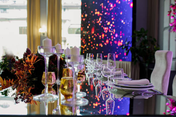 istock Arranged table with plates and glasses on a wedding reception 1391063107