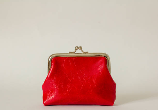 istock A closed red coin purse on a white background with a space for copying. 1391063186