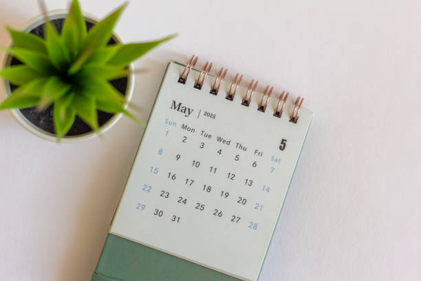 istock Desktop calendar for May 2022 for planning.Spring is in the yard. 1391063512