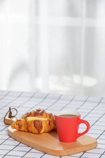 Breakfast at the table by the window