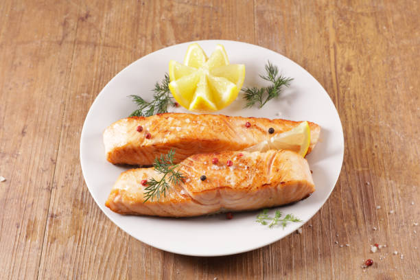 istock baked salmon fillet and lemon 1391064930
