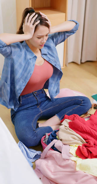 istock worried girl with clothes 1391065048