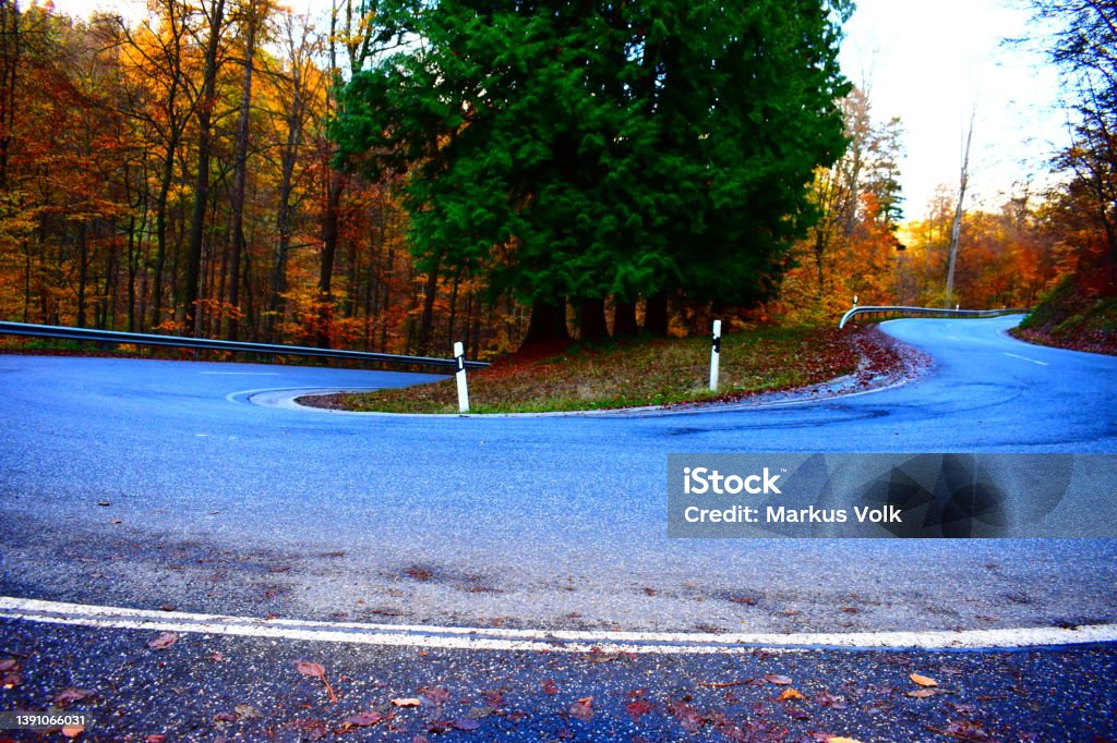 u-turn of a country road in autumn Rhineland-Palatinate, road between Adenau and Nürburgring Nürburgring Stock Photo