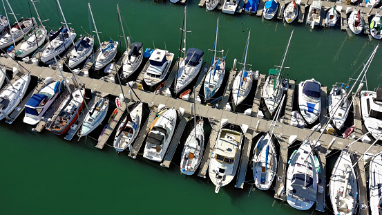 Large Group Of Luxury Boats Are Waiting At The Marina