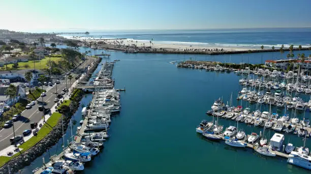 Aerial View Of Oceanside Harbor with colorful sailboats.