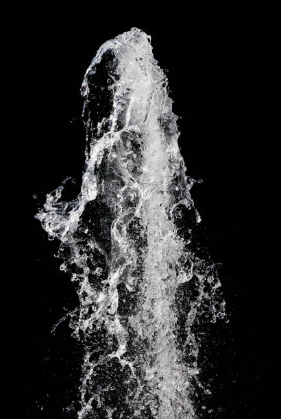 istock Water splash isolated over black background, vertical orientation 1391067380