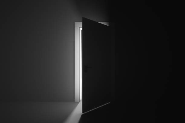 istock Ajar door to a mysterious brightly lit room 1391069126