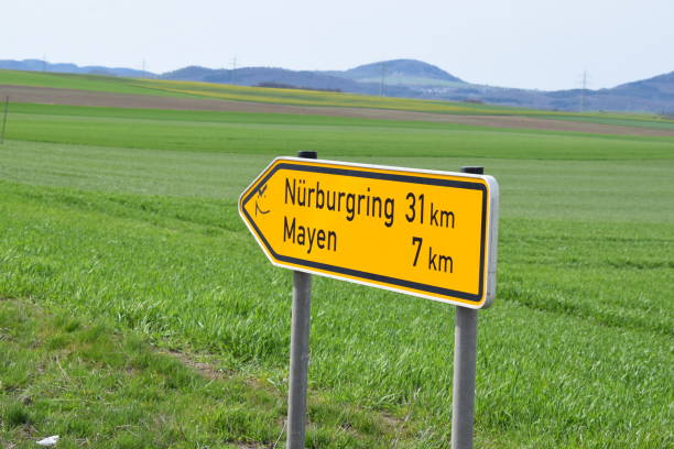 traffic sign to Mayen and Nürburgring Rhineland-Palatinate nürburgring stock pictures, royalty-free photos & images