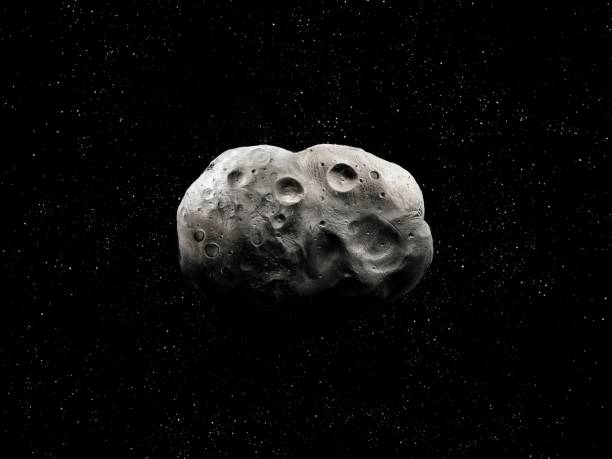 istock Celestial body in the solar system. The surface of the asteroid is covered with craters. 1391071945