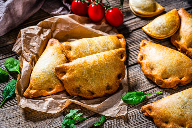 istock Argentinians Empanadas shot on wooden table 1391075652