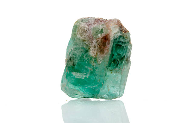 istock macro mineral stone emerald on a white background 1391077328