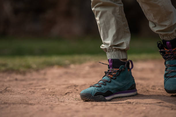 istock Man wearing hiking boots 1391077669