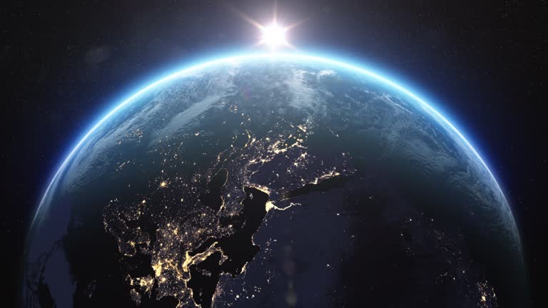 Sunrise Over the World. New Day. Beautiful Blue Planet Earth and Sun Rising View from Space NASA Data. 3d Animation Planet Rotating Skyline. Night Cities. Modern Business Technology Concept