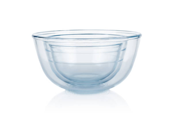 istock Empty glass food bowls  isolated on white background 1391081546
